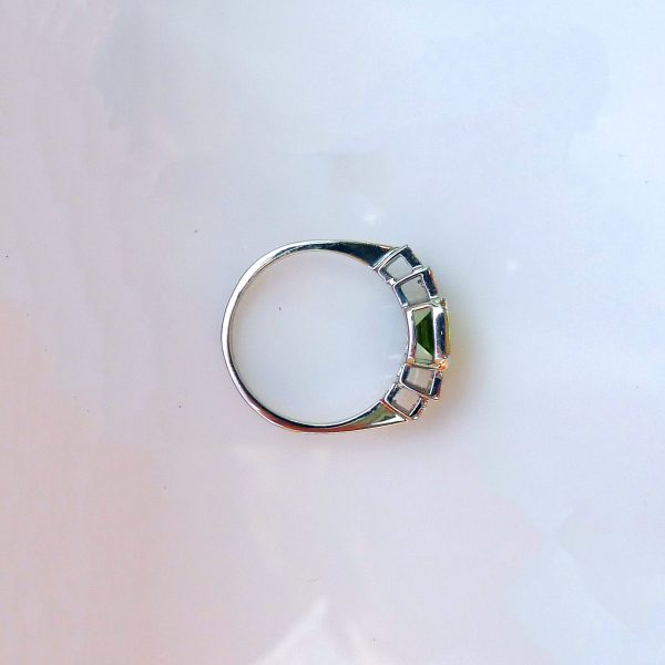 Peridot on side Platinum Peridot & Diamond Dress Ring